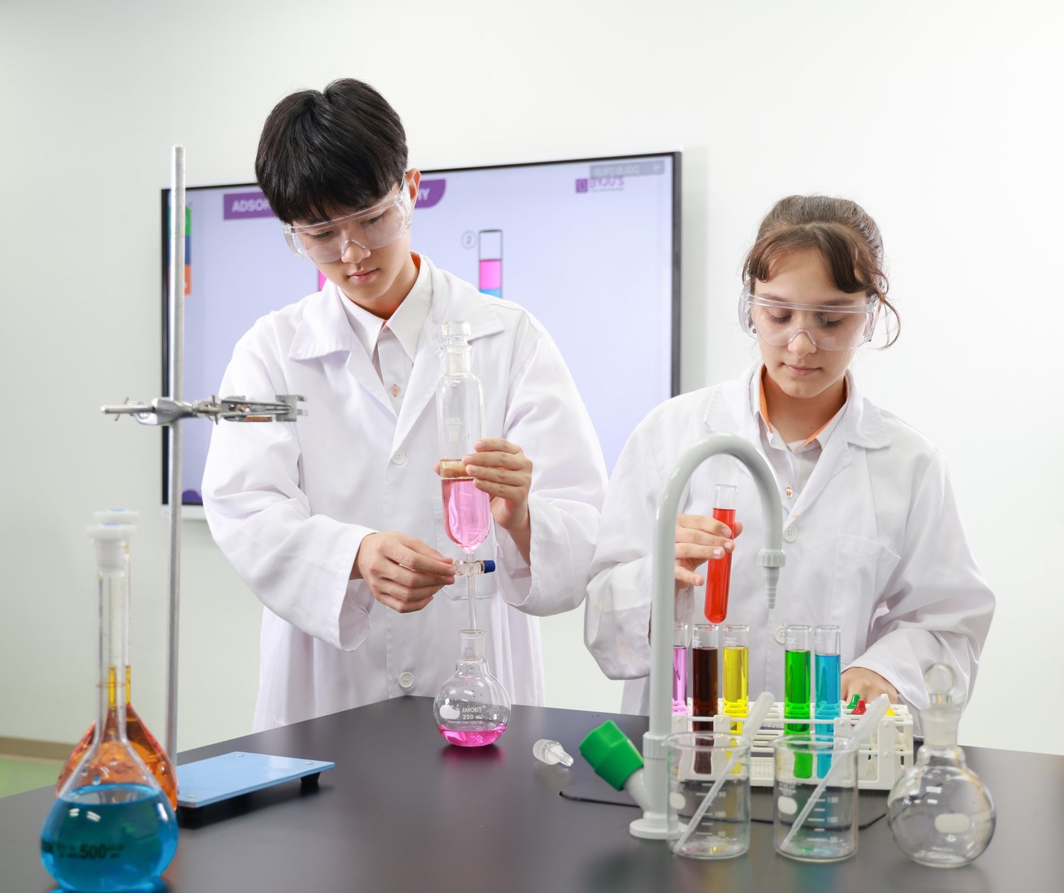 Students in a science lab at SIS